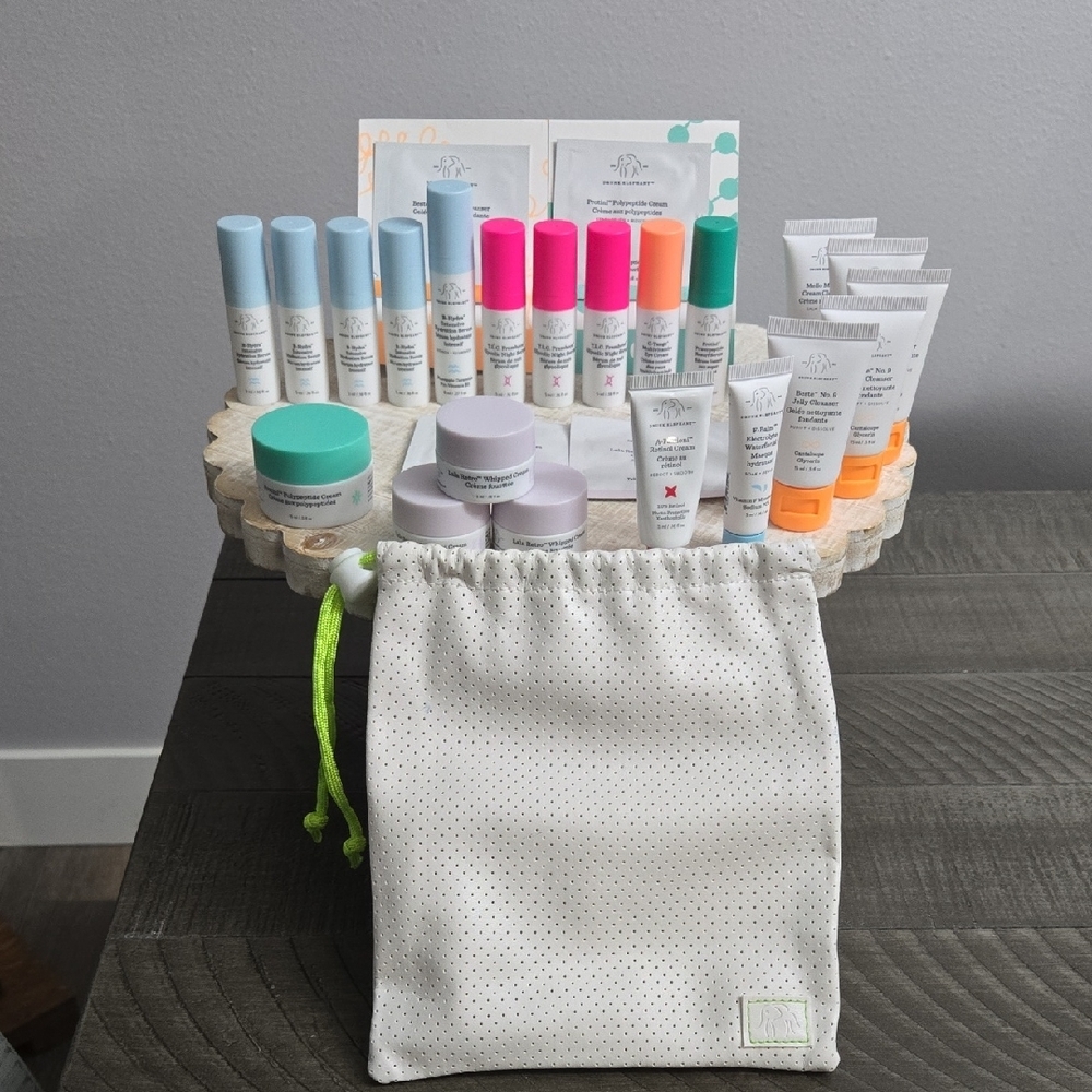Drunk Elephant Skincare Collection with White and Green Pouch
